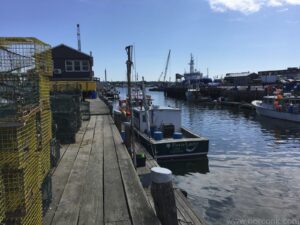 Fishing boats and lobster traps on a Wharf